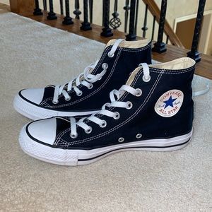 Converse. New. Barely worn. Black. Size women’s 8